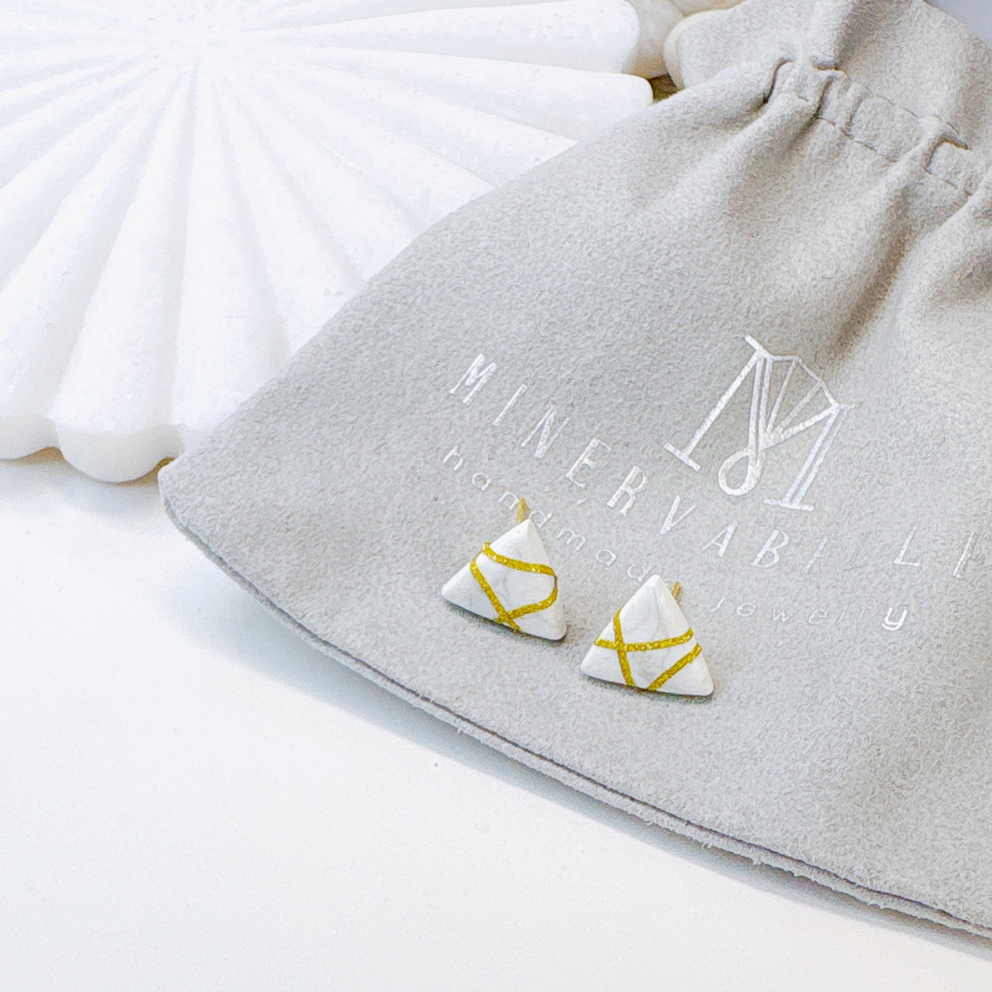 Black Polymer Clay Triangle Stud Earrings with Gold Glitter Line Design