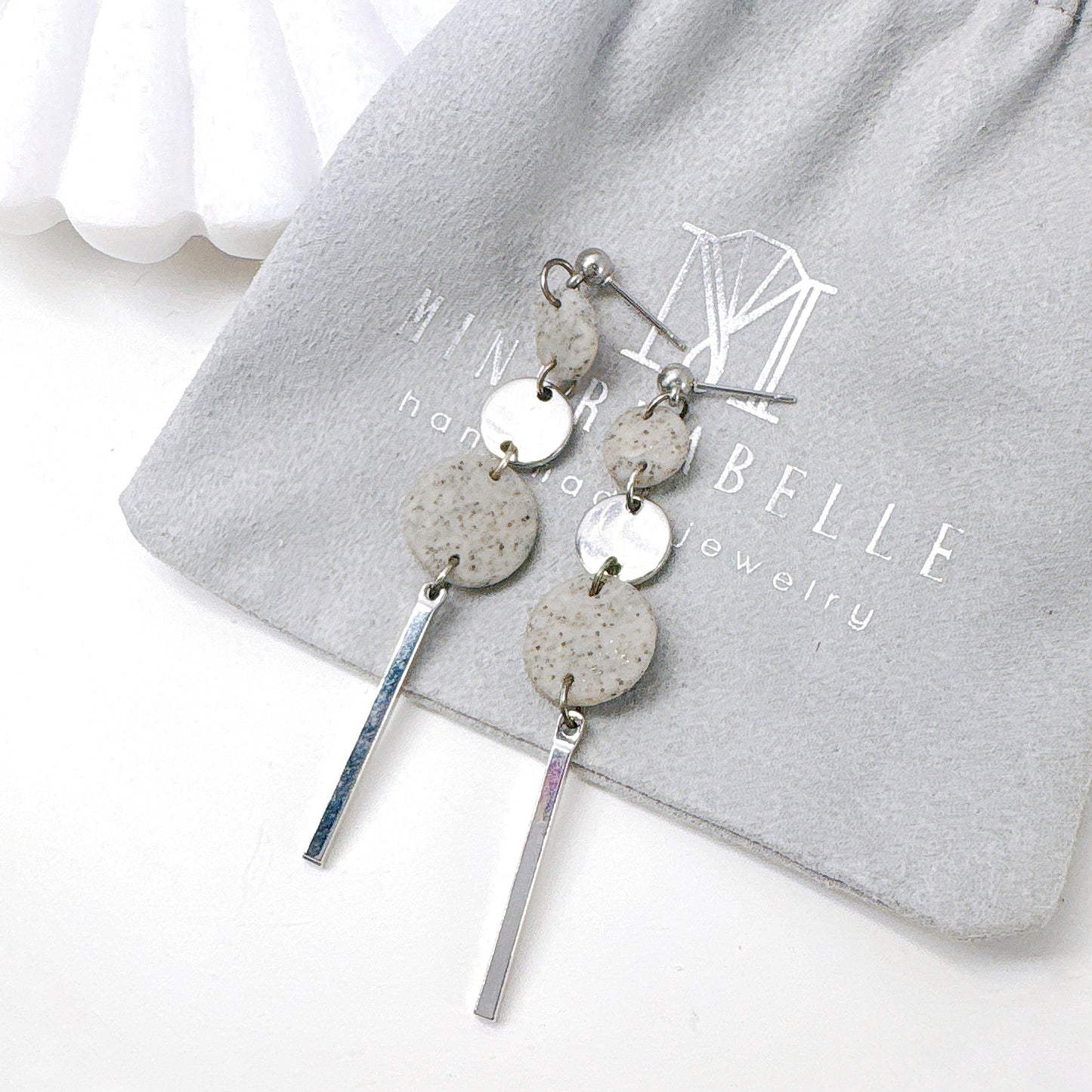 Silver and White Stone Triple Circle Bar Dangle Earrings