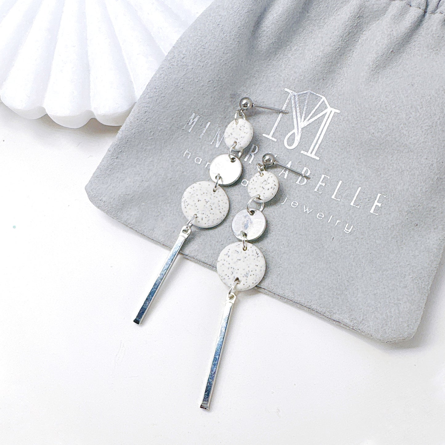 Silver and White Stone Triple Circle Bar Dangle Earrings