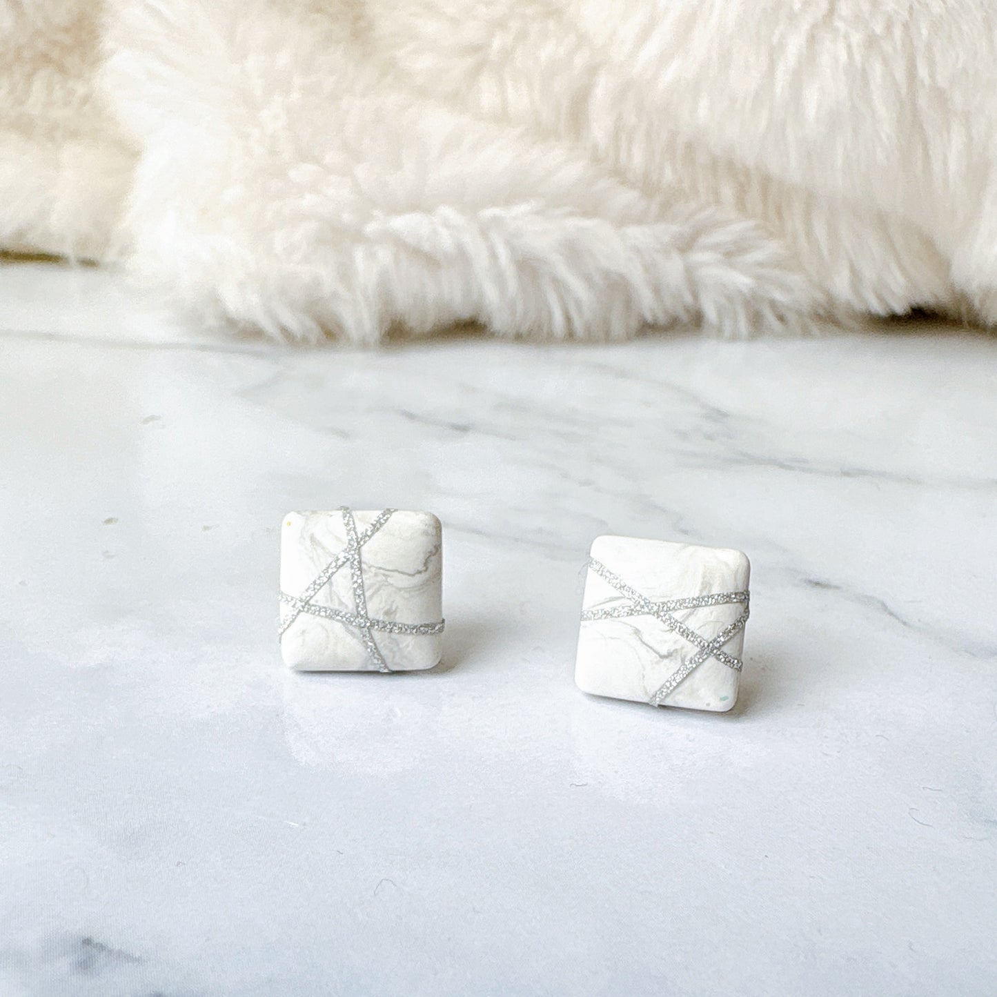 Black Square Stud Earrings with Silver Glitter Line Design