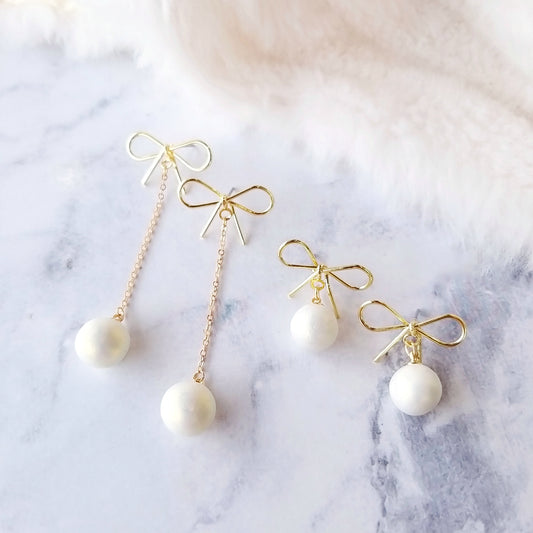 Golden bow pearl dangle earrings, handmade with surgical-steel posts