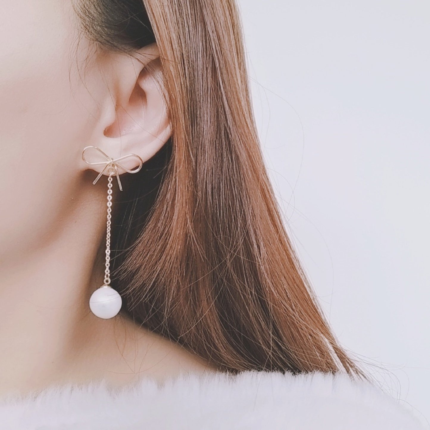 Golden Bow Pearl Earrings